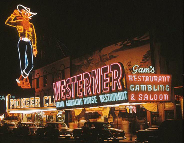 Westerner 1953-1954 exterior nighttime with neon sign underneath Vegas Vic